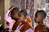 Novice nuns walking through Mahamuni Paya, Myanmar 